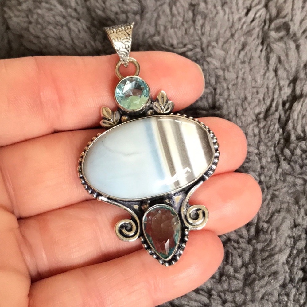 Ornate Blue and Silver Necklace with Intricate Design